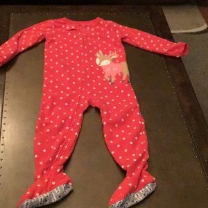 Footed, fleece holiday pajamas.